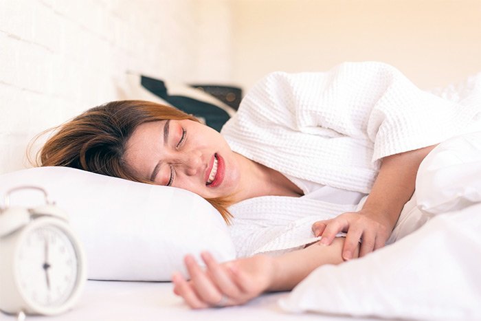 Lady Grinding Teeth While Sleeping